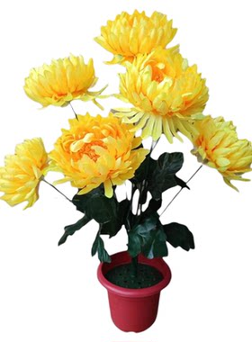 清明节塑料花祭祀黄白色墓碑上坟