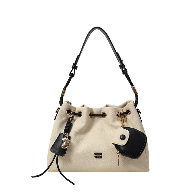 南风Chio2nd 季风旅程托特包包女2025新款超火通勤抽绳单肩斜挎包