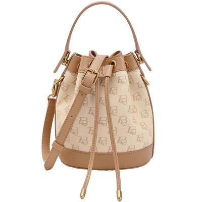 复古休闲水桶包百丽老花与皮拼接