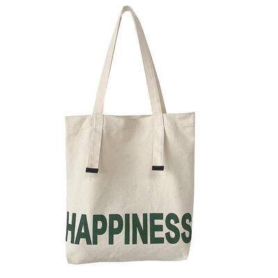 原创简约字母大容量单肩帆布包男