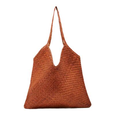 度假风手工牛皮编织单肩包