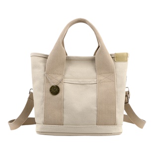 日本多分格帆布包单肩斜挎包母婴妈咪包托特包女包大容量