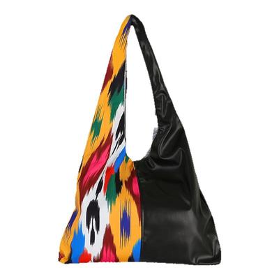 新疆艾德莱斯大容量旅行包