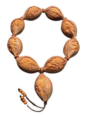 浅浮雕包衣九龙橄榄核手串