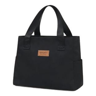 新款时尚男士手提包外出轻便男女通用通勤包大容量防水妈咪布包