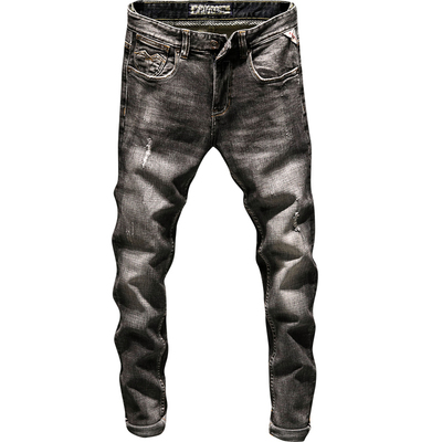 修身型春季刮烂潮流中低腰牛仔裤