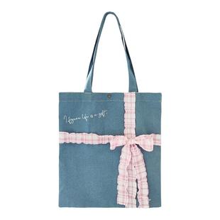 超额假期小众设计感礼物绑带牛仔帆布包单肩包包女大容量学生通勤