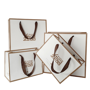 女服装手提袋子定制100个起订高档覆膜白卡纸袋logo印刷包邮送货