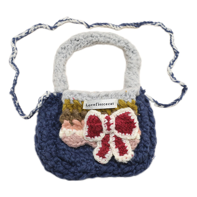 韩版甜美编织蝴蝶结手提包百搭