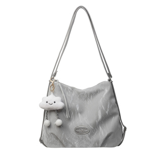 银色旅行双肩包女2025新款潮时尚单肩包大容量多用斜挎水桶包背包