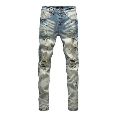 高端轻奢泼墨涂鸦破洞补丁牛仔裤