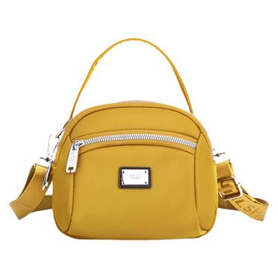 手提贝壳百搭风防水尼龙小布包