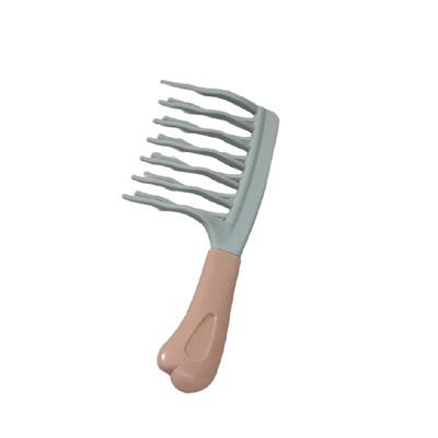 双排波浪齿手柄头皮按摩发