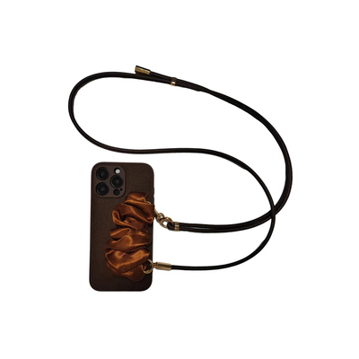 ZEST焦糖色丝巾腕带适用苹果17promax手机壳iphone16pro挂绳斜挎15月坑纹保护套手拎支架14小众13/12/11