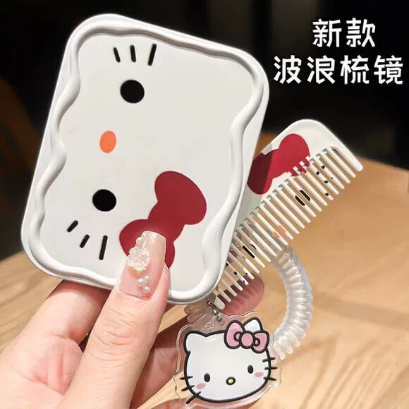 凯蒂猫小镜子化妆镜学生外出便携随身镜可折叠补妆镜口袋镜梳一体