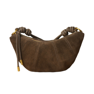 怪兽君小众法式磨砂牛皮牛角包斜挎小包包真皮单肩可颂包饺子包潮