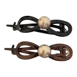 蝴蝶结气质珍珠一字抓夹女2025新款高级感扭扭发夹后脑勺鲨鱼夹子