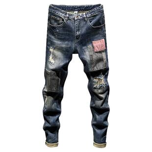 痞帅美式秋冬潮牌工装牛仔裤男韩版修身小脚百搭高街个性拼接贴布