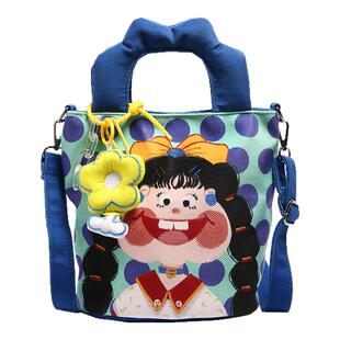 帆布小包包2025新款可爱卡通插画包少女手拎水桶包百搭单肩斜挎包