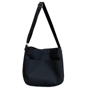 大容量男潮帆布邮差包日系简约复古宽肩带斜挎包女文艺学生单肩包