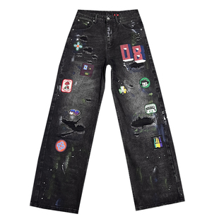 痞帅个性泼墨涂鸦黑色假破洞牛仔裤男款潮流微章设计感阔腿长裤子