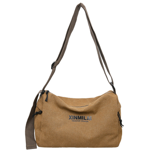 复古帆布斜挎包男通勤单肩包运动旅行健身包工装风做旧休闲枕头包