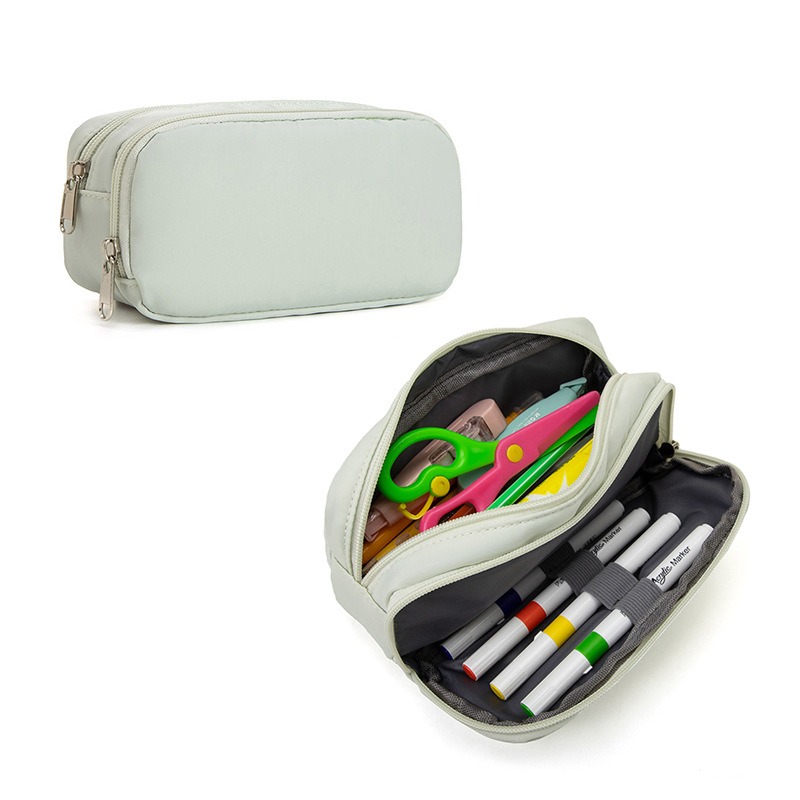 跨境学生文具包简约时尚袋耐脏中小学生大容量隔层文具多女笔袋初