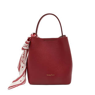 西木汀 异乡人 牛皮手提水桶包女2026新款白色斜挎包秋时尚单肩包