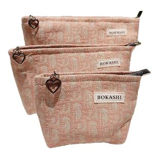 轻奢高级感小化妆包女大容量便携式2025新款网红外出旅行随身收纳