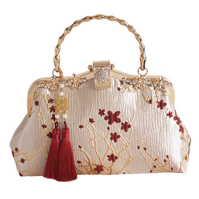 新中式浮雕织花手提包