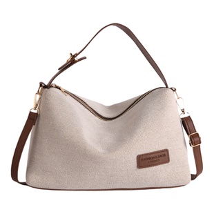 斜挎包包女小众设计2026新款大容量针织布单肩包日杂小拎包