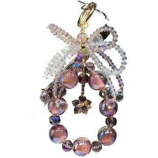 梦幻紫色星空手机链爆闪人鱼姬挂链手提溜旋转花朵吊坠手链精致水晶蝴蝶结包包挂饰女富家千金绝美时尚挂件壳