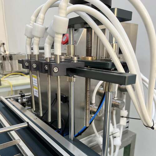 全自动液体灌装生产线 4头液体灌装机白酒精油口服液瓶小型罐装机