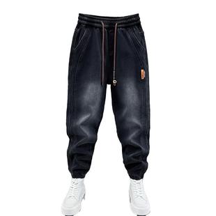 秋冬潮流加绒黑色磨白牛仔裤男士松紧腰拼接小脚裤弹力束脚哈伦裤