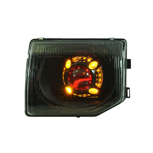 猎豹黑金刚改装大灯奇兵帕杰罗v33激光透镜车灯熏黑复古原厂总成