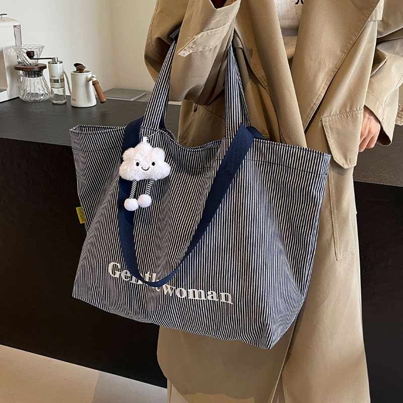 条纹大容量帆布包女2025新款时尚手提购物袋通勤包百搭单肩托特包
