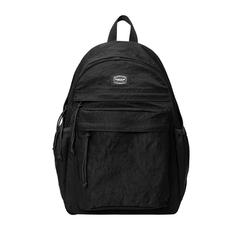 自由大道日系简约双肩包男潮牌轻便户外背包女学生书包初中生高中
