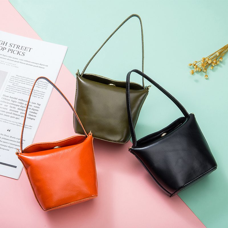 新品 零钱包女手拎包外贸 小众水桶小包包买菜包耳机包手提迷你硬