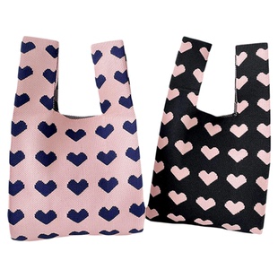 针织手提包包2025新款新年小众撞色爱心单肩包出街手腕包百搭礼袋