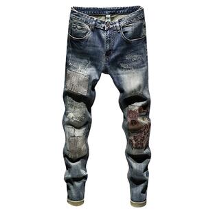 潮牌破洞针缝牛仔裤男士港风拼接贴布修身小脚裤重工刺绣痞帅个性