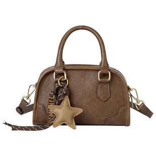 啄木鸟真皮手提包女2025新款保龄球包包轻奢小众高级感波士顿斜挎