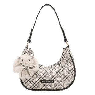 香港品牌原创小众月牙包包女式2025新款通勤手提腋下包单肩新月包