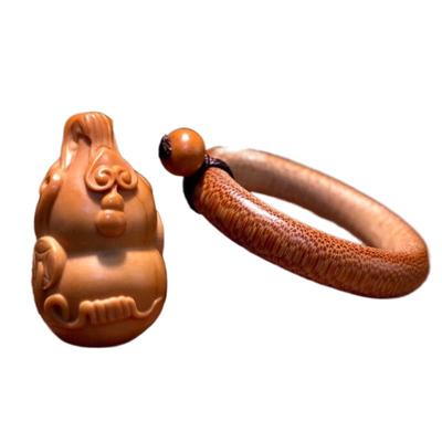 橄榄核雕小葫芦手把件