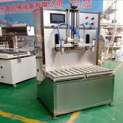 济南天鲁称重式液体灌装机 weighing liquid filling machine