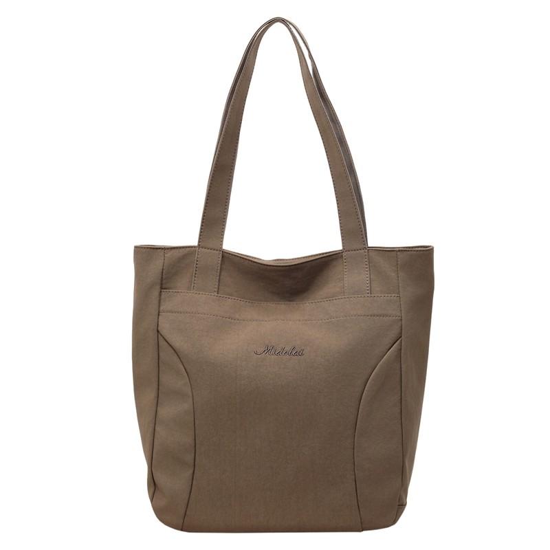 帆布包包女2025新款上班通勤高级感大容量手提袋托特包单肩帆布袋