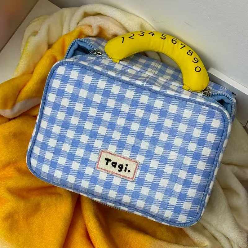 新品 包包tagi哈兜callme收纳袋大容量手提包简约便携分层化妆包