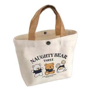 帆布包小巧型百搭手提小布包女学生饭盒袋卡通印花上班族手拎包