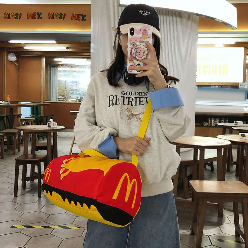 新品 休闲尼龙帆布圆筒包包女2025新款时尚运动单肩斜挎包