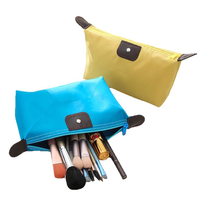 韩版大容量饺子化妆包手包式可折叠旅行洗漱收纳包糖果色水饺包