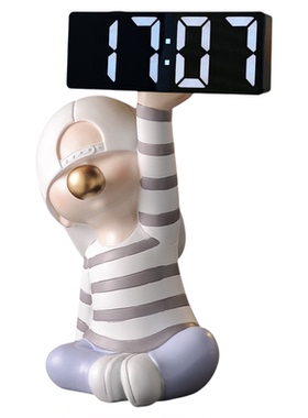 现代吹泡泡男孩闹钟摆件